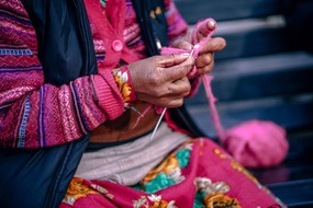 Central & South America cruises - Peruvian woman knitting